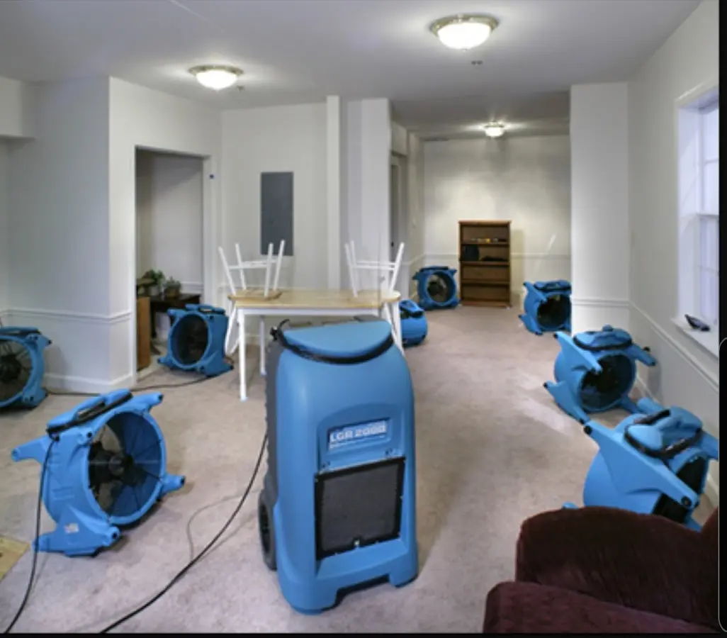 Air movers and dehumidifier setup for Water Damage Restoration in New Carlisle
